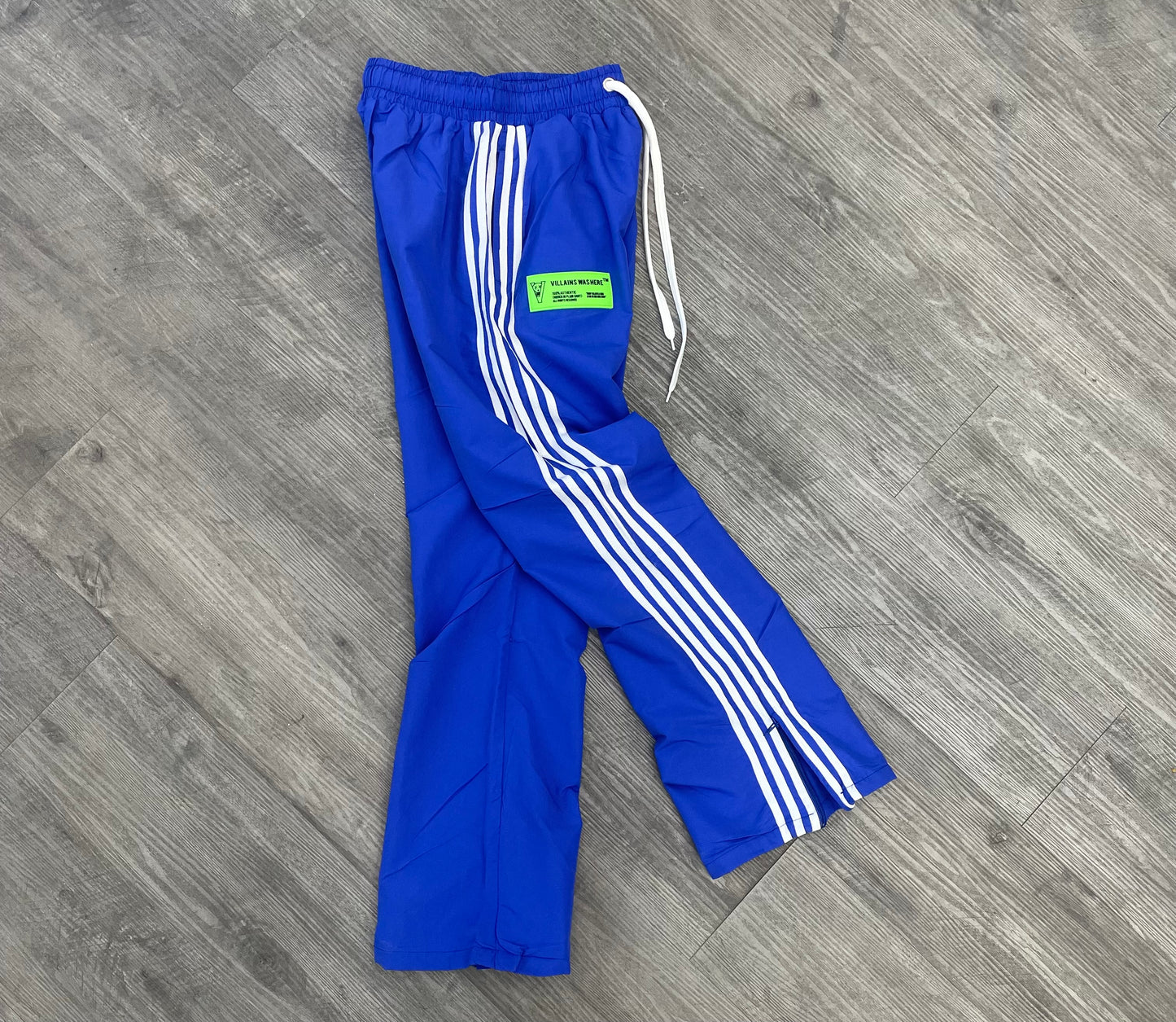 VILLAINS WAS HERE TRACK PANTS BLUE