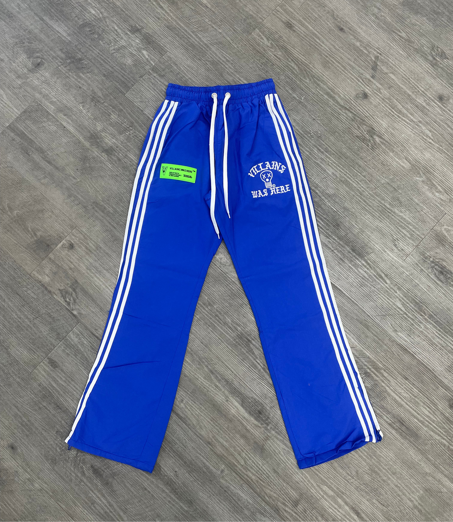 VILLAINS WAS HERE TRACK PANTS BLUE