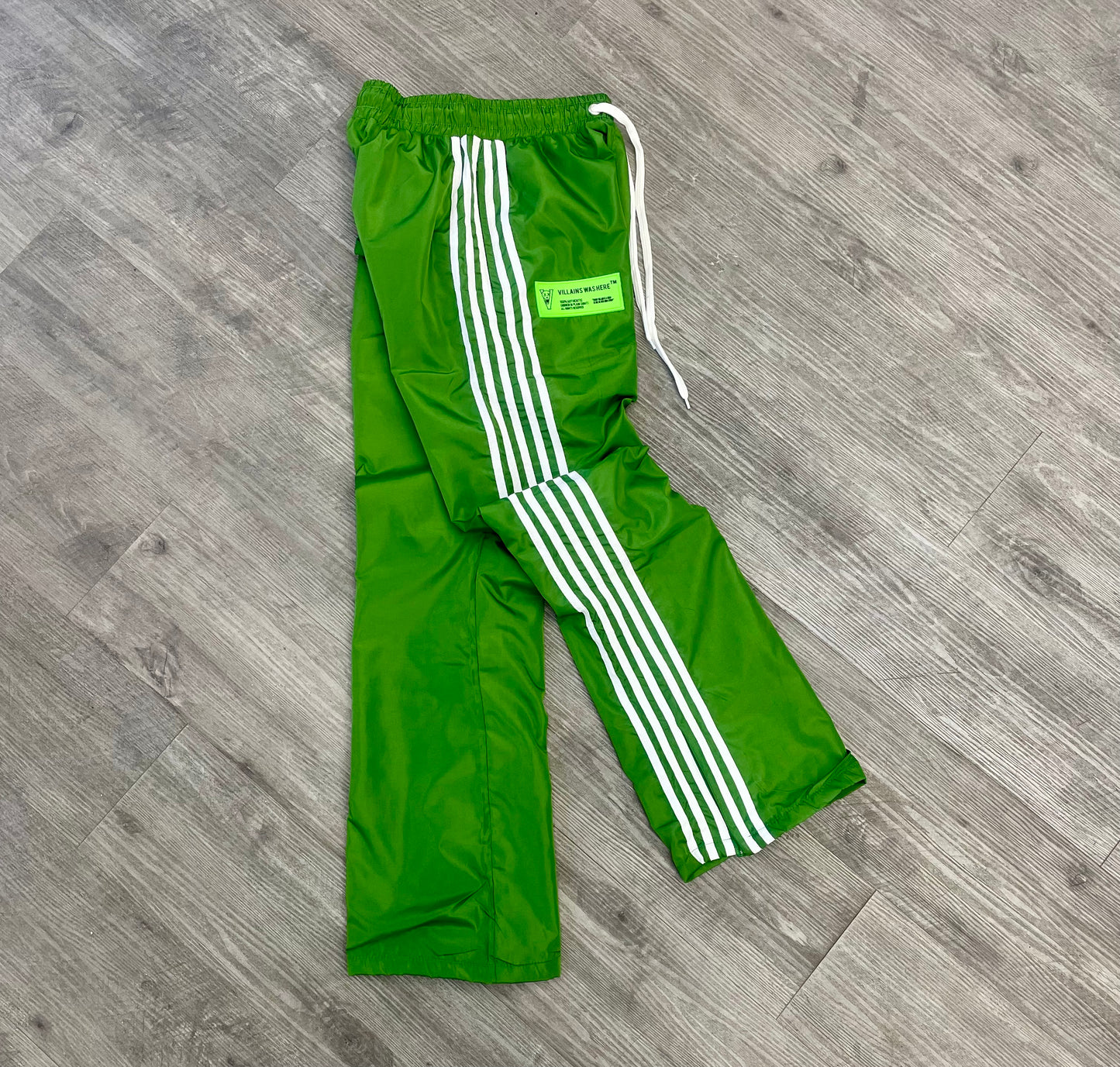 VILLAINS WAS HERE TRACK PANTS GREEN