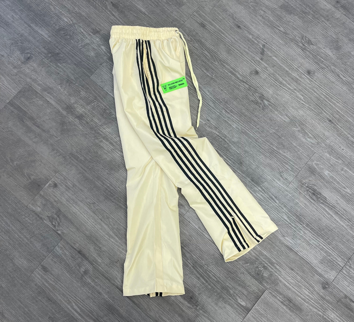 VILLAINS WAS HERE TRACK PANTS CREAM