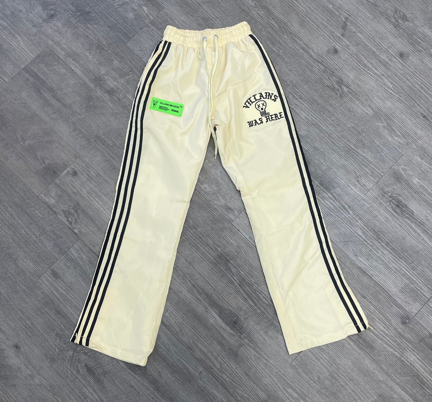 VILLAINS WAS HERE TRACK PANTS CREAM